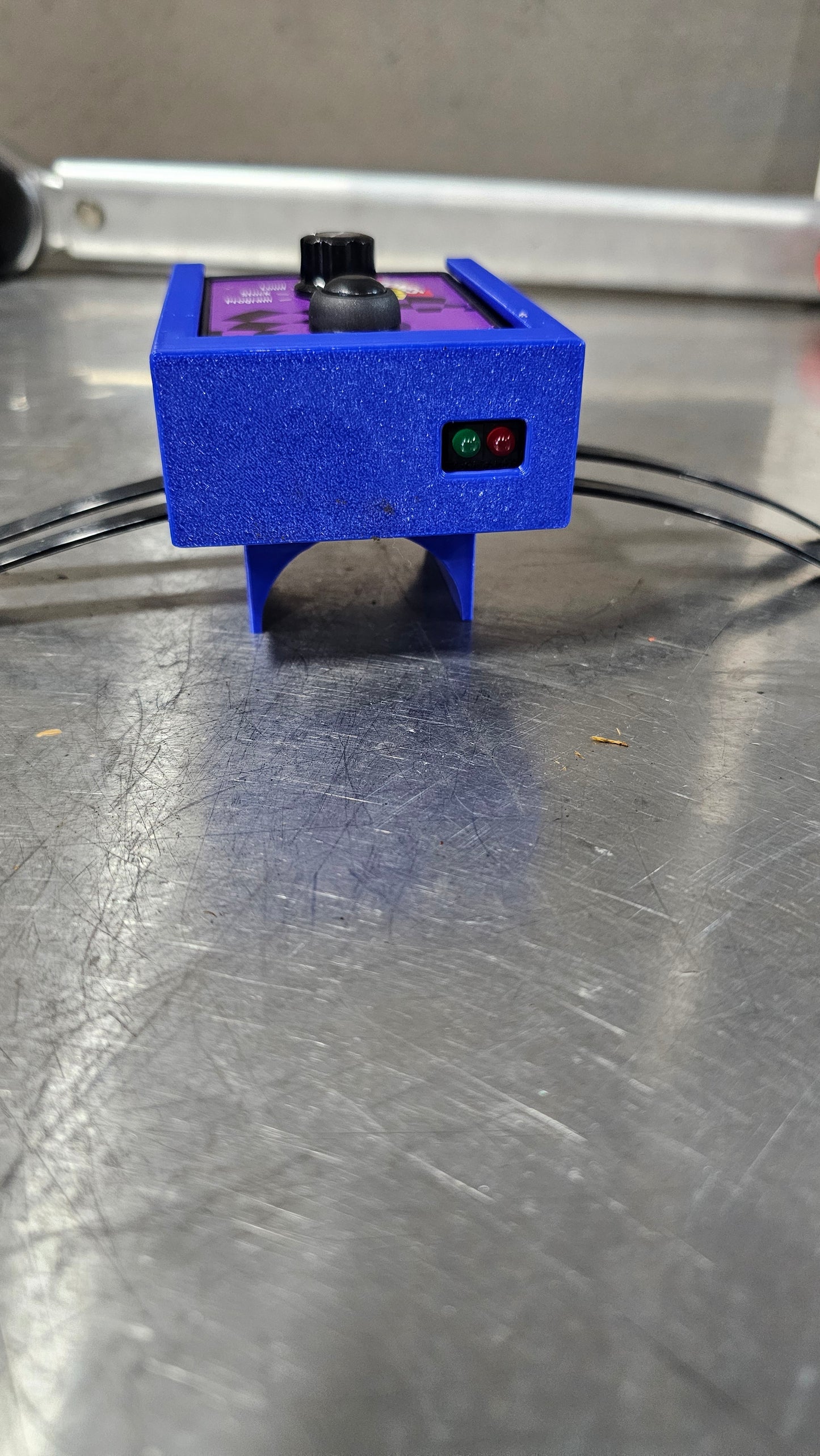 Track nanny roll cage mount